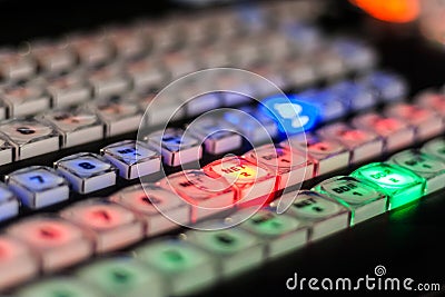 Video mixer with colored buttons with light. Red, green and blue buttons Stock Photo