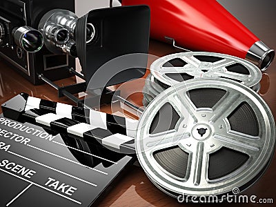 Video, movie, cinema vintage concept. Retro camera, reels and cl Stock Photo