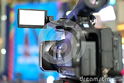 video production camera recording live event on stage. television social media broadcasting seminar conference Stock Photo