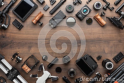 Video production tools on brown table view from above Stock Photo