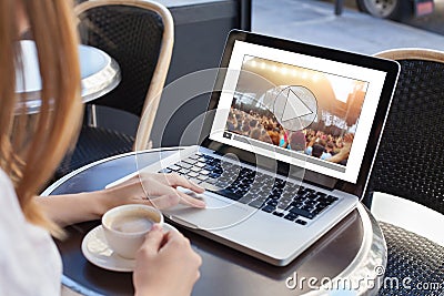 Video streaming, online concert, woman watching live music clip on internet Stock Photo