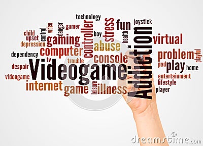Videogame addiction word cloud and hand with marker concept Stock Photo