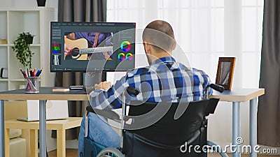Videographer in home office Stock Photo