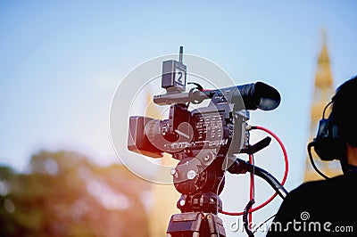 The videographer shoots behind-the-scenes photos of the production Stock Photo