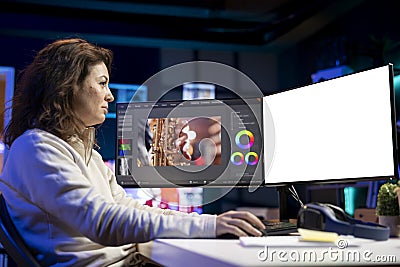 Videographer using professional software on mockup PC to create visual effects Stock Photo