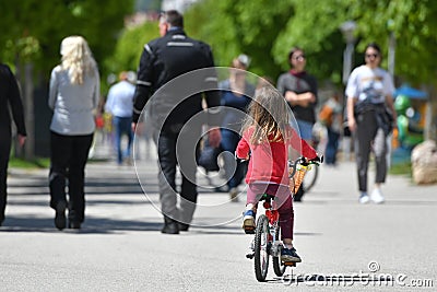 Lots of people on the esplanade in Gmunden on Mother`s Day in the sunshine, Ã–sterreich, Europa Editorial Stock Photo