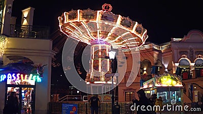 VIENNA, AUSTRIA - DECEMBER, 24, 2016 Big chain carousel in Prater public park in the evening. Popular touristic Editorial Stock Photo