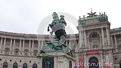 VIENNA, AUSTRIA - DECEMBER, 24 Statue in front of Austrian National Library on Heldenplatz. Popular touristic Editorial Stock Photo