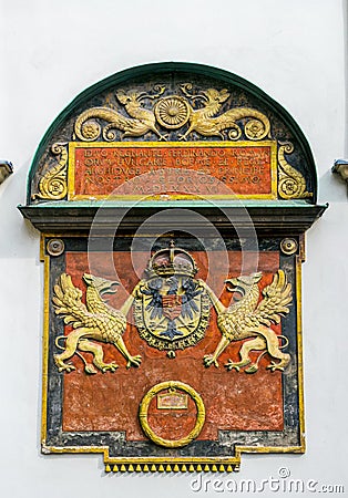 Heraldic coat of arms of the Habsburg dynasty. Decorative wall decoration of an old building in Vienna, Austria Editorial Stock Photo