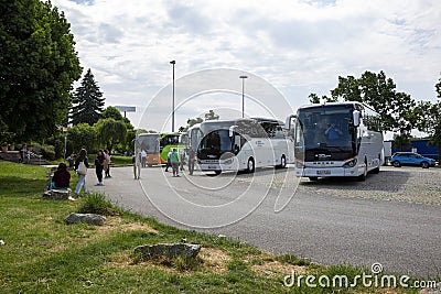 Parking of tourist buses on the intercity highway in Austria Editorial Stock Photo