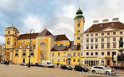 Vienna central square with Schottenkirche church and Benedictine Abbey Stock Photo