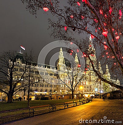 Vienna Town Hall and Christmas Market at night Stock Photo