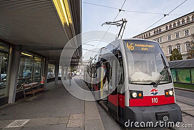 Vienna tram, also called strassenbahn, the most recent model. passing by on the iconic ringstrasse in the city center of the city. Editorial Stock Photo