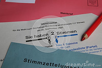 Closeup of german ballot paper for postal voting with red pencil and envelopes Editorial Stock Photo