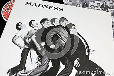 Closeup of british Ska band Madness vinyl record album cover one step beyond from 1979 Editorial Stock Photo