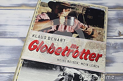 Closeup of Klaus Denart book cover Mr. Globetrotter, founder of Outdoor speciality shop Editorial Stock Photo