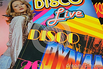 Close up of isolated retro vinyl record covers with disco music compilation from seventies Editorial Stock Photo