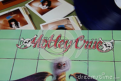 Close up of isolated vinyl record covers of heavy metal band Motley Crue Editorial Stock Photo