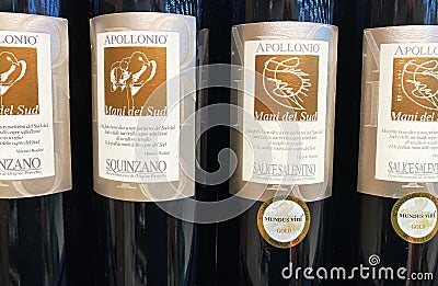 Closeup of italian Apollonio red wine bottles Editorial Stock Photo