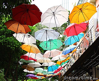 Vietnam. Ho Chi Minh. Street with umbrellas Editorial Stock Photo