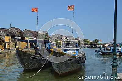 Destination scenic of two large fishing boats on the Thu Bon River, Hoi n Vietnam Editorial Stock Photo