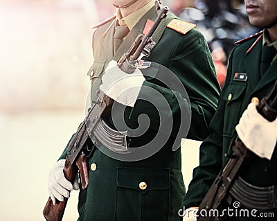 Vietnam solder in long rifle weapon marching outdoor Editorial Stock Photo