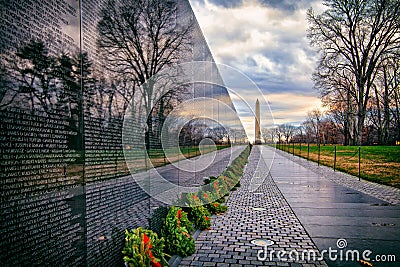 Vietnam War Memorial with Washington Monument at Sunrise, Washington, DC, USA Editorial Stock Photo