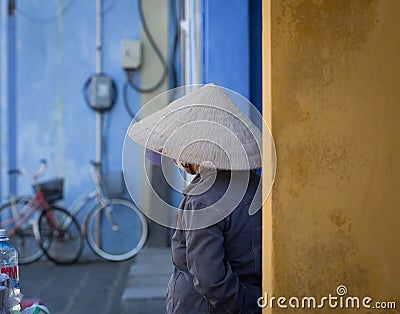 Vietnam woman takes a rest at the market Editorial Stock Photo