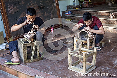 Vietnamese artisans making traditional bronze censers Editorial Stock Photo
