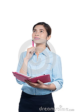 Vietnamese Businesswoman take note on notebook Stock Photo