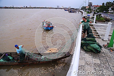 Vietnamese fisherman couple Editorial Stock Photo