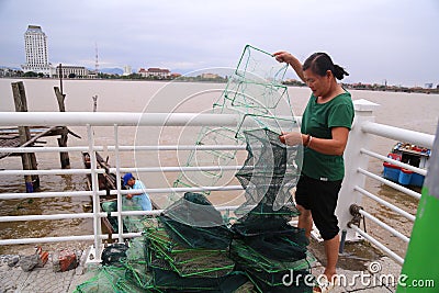 Vietnamese fisherman couple Editorial Stock Photo