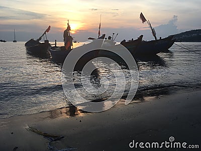 Vietnamese fishing boats at sunset Editorial Stock Photo