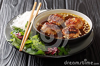 Vietnamese Grilled Pork Meatballs with Vermicelli Noodles Bun Cha is a classic Northern Vietnamese dish closeup in the plate. Stock Photo