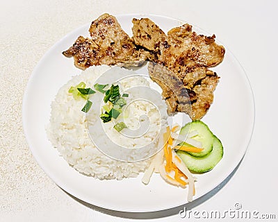 Vietnamese Lemongrass Chicken Chop Rice. Stock Photo