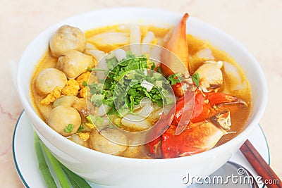 Vietnamese noodle with crab and mushroom or banh canh cua in white bowl Stock Photo