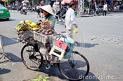 Vietnamese people with Bicycle Fruit Shop Editorial Stock Photo