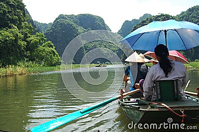 Vietnamese people and foreign traveler travel visit and amazing boat tour trip Tam Coc Bich Dong or Halong Bay on Land and Ngo Editorial Stock Photo