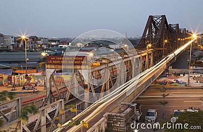 Vietnamese people riding motorcycles on Long Bien bridge Editorial Stock Photo