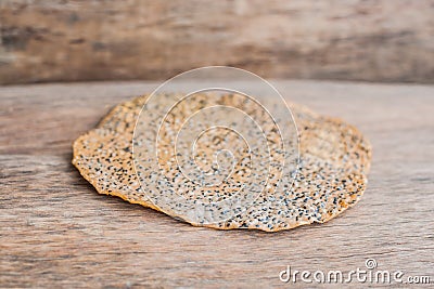 The Vietnamese Sesame Rice Cracker is called Banh Da and is made of tapioca flour, rice flour, salt, and sprinkled with black sesa Stock Photo