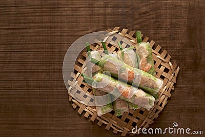 Vietnamese spring rolls - rice paper, lettuce, salad, vermicelli, noodles, shrimps, vegetables. Stock Photo