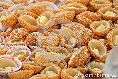 Vietnamese street food, bunch of Sesame Balls display in the market close up Stock Photo