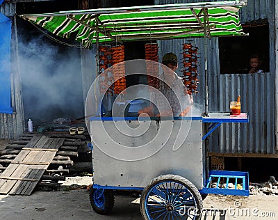 Vietnamese street food, roasted quails Editorial Stock Photo