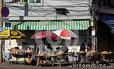 Vietnamese street vendor sell peanut Editorial Stock Photo