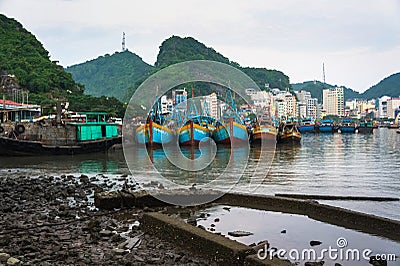 Vietnamese traditional fishing boats in the port Editorial Stock Photo