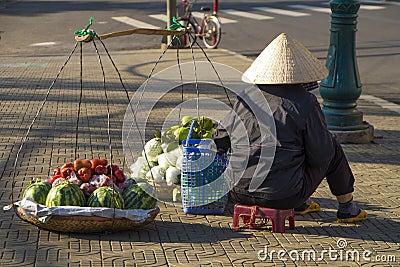 Vietnamese vendors selling fruit and vegetables Editorial Stock Photo