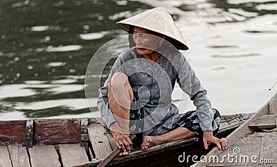 Vietnamese woman in boat Editorial Stock Photo