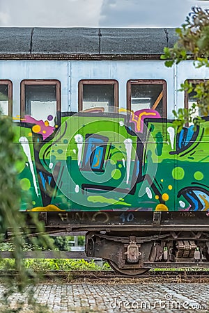 View of a abandoned older rustic train, wagon with graffiti street art Editorial Stock Photo
