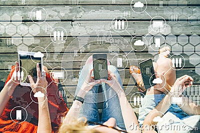 View from above. Close-up of smartphones in hands of three women. Stock Photo