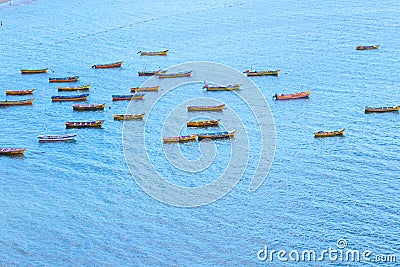 View from above of little fishing boats in the coasts of Lirquen Port Editorial Stock Photo